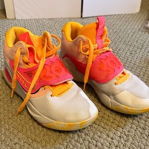 Nike Renew Women’s pink/Orange Athletic Shoes